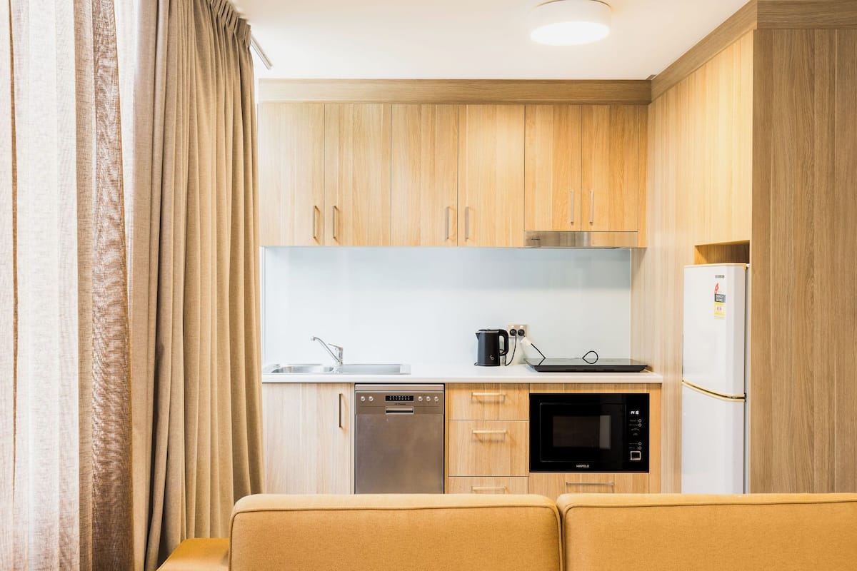 cabinet queen twin & sofa (capital s) | private kitchen | fridge, electric kettle