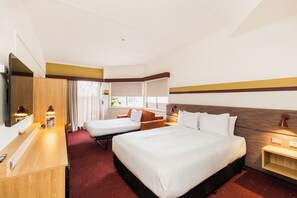 Queen Sofa Balcony Room | Desk, blackout drapes, soundproofing, iron/ironing board