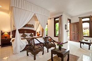 Suite Room | 1 bedroom, minibar, desk, blackout drapes