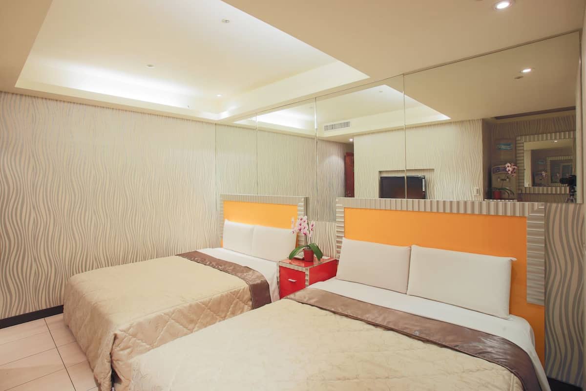 Family Room, 2 Queen Beds | Minibar, desk, iron/ironing board, free WiFi