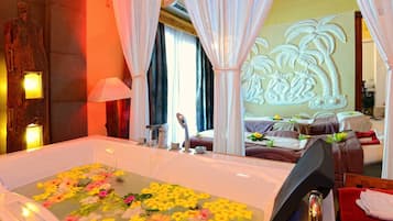 Relax in a serene space with a bathtub, modern design, and a large mirror.