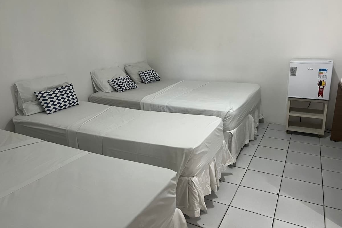 Basic Quadruple Room | Blackout curtains, free WiFi, bed sheets