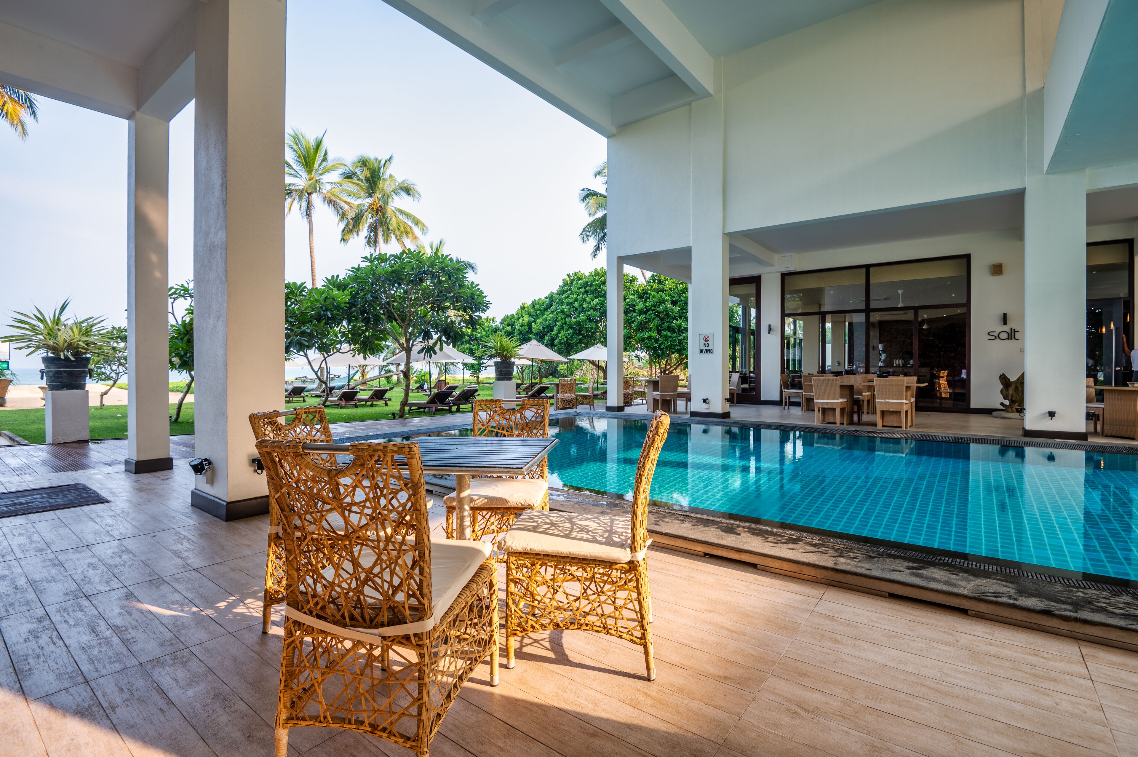 outdoor pool, pool umbrellas, pool loungers