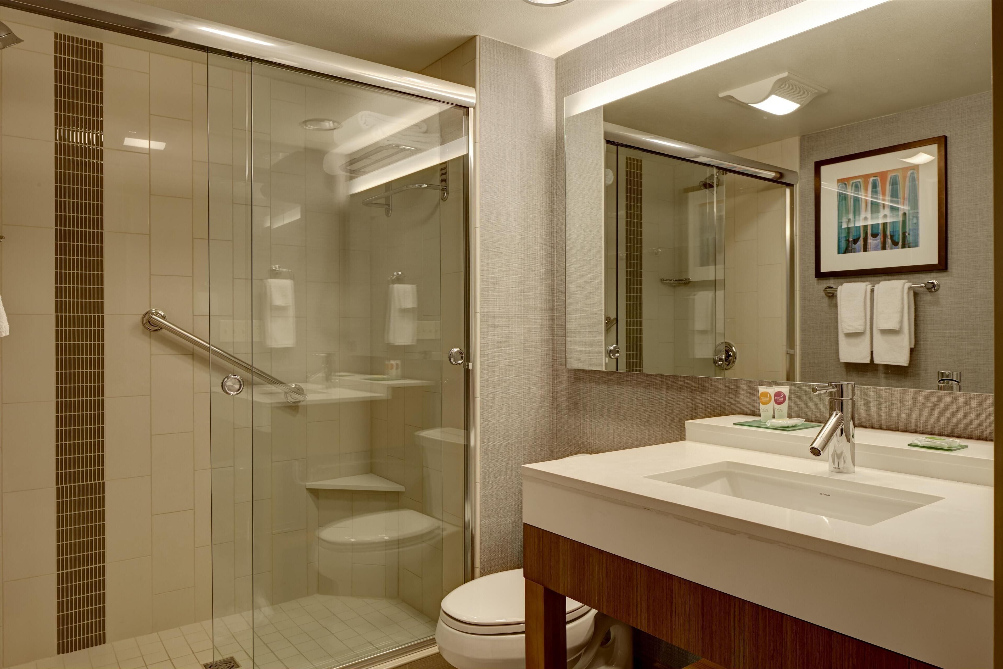 shower, designer toiletries, hair dryer, bathrobes