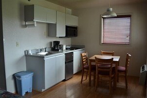 Suite, 2 Queen Beds, Kitchenette, Mountain View | Desk, soundproofing, iron/ironing board, free WiFi