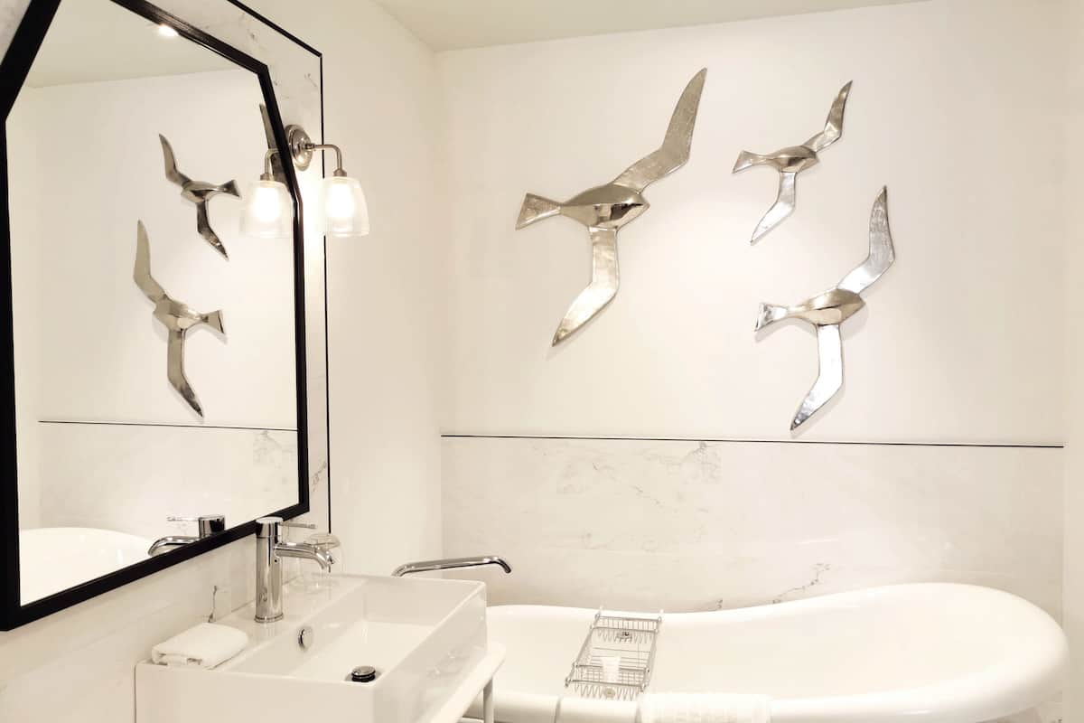 deluxe suite | bathroom | free toiletries, hair dryer, bathrobes, slippers