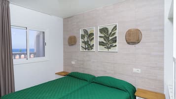 Estúdio | Cofres nos quartos, berços grátis, Wi-Fi de cortesia, roupa de cama