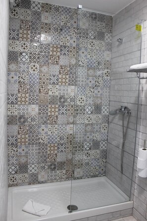 Bathtub, hair dryer, towels