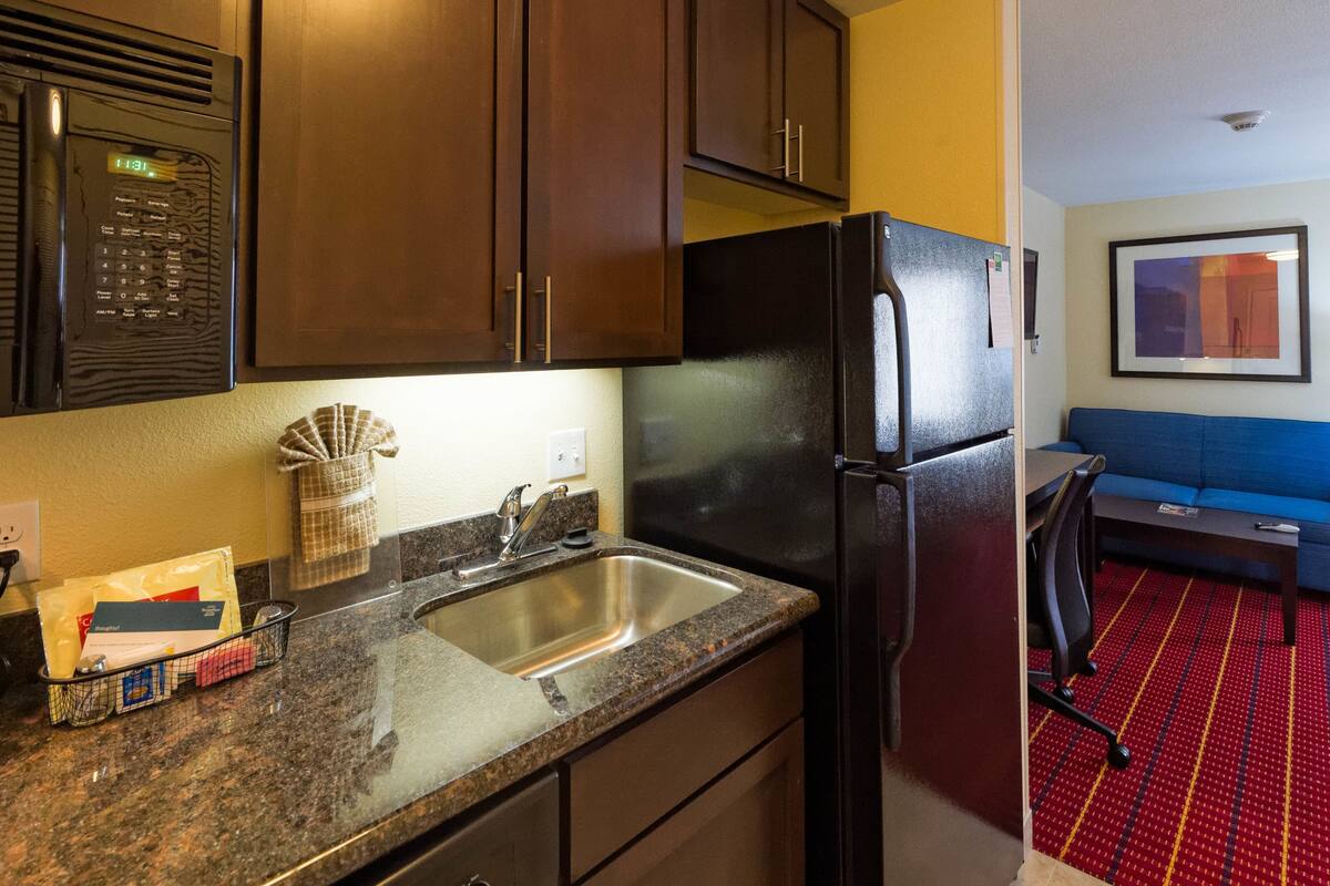 full-sized fridge, microwave, stovetop, dishwasher