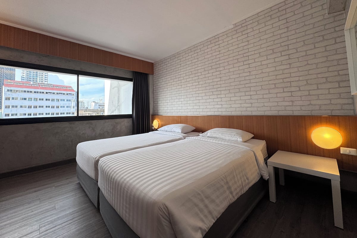 Superior Twin kamer | 1 slaapkamer, een minibar, een kluis op de kamer, een bureau