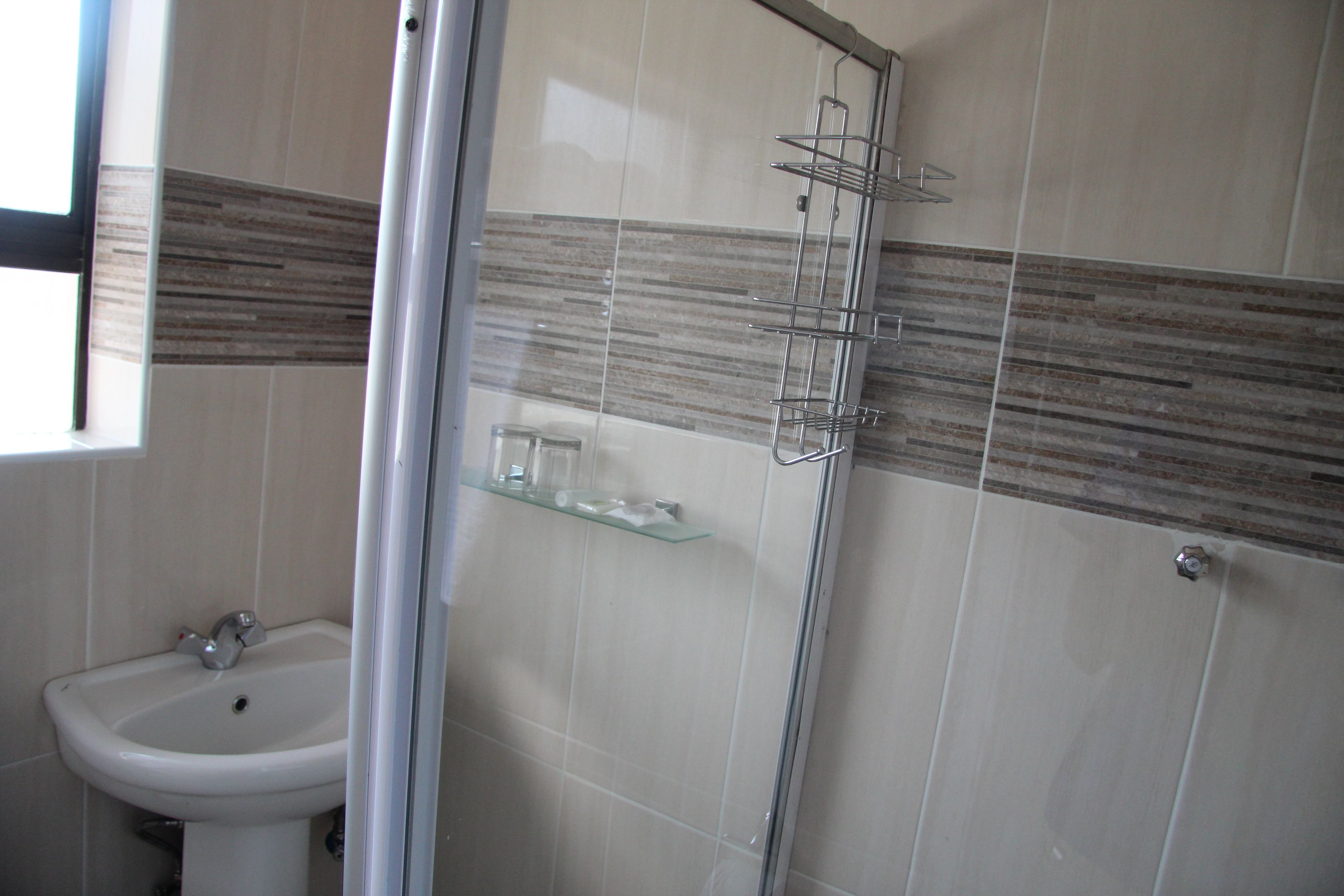 Shower, free toiletries, hair dryer, towels