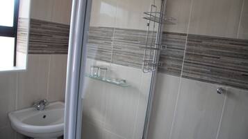 Shower, free toiletries, hair dryer, towels