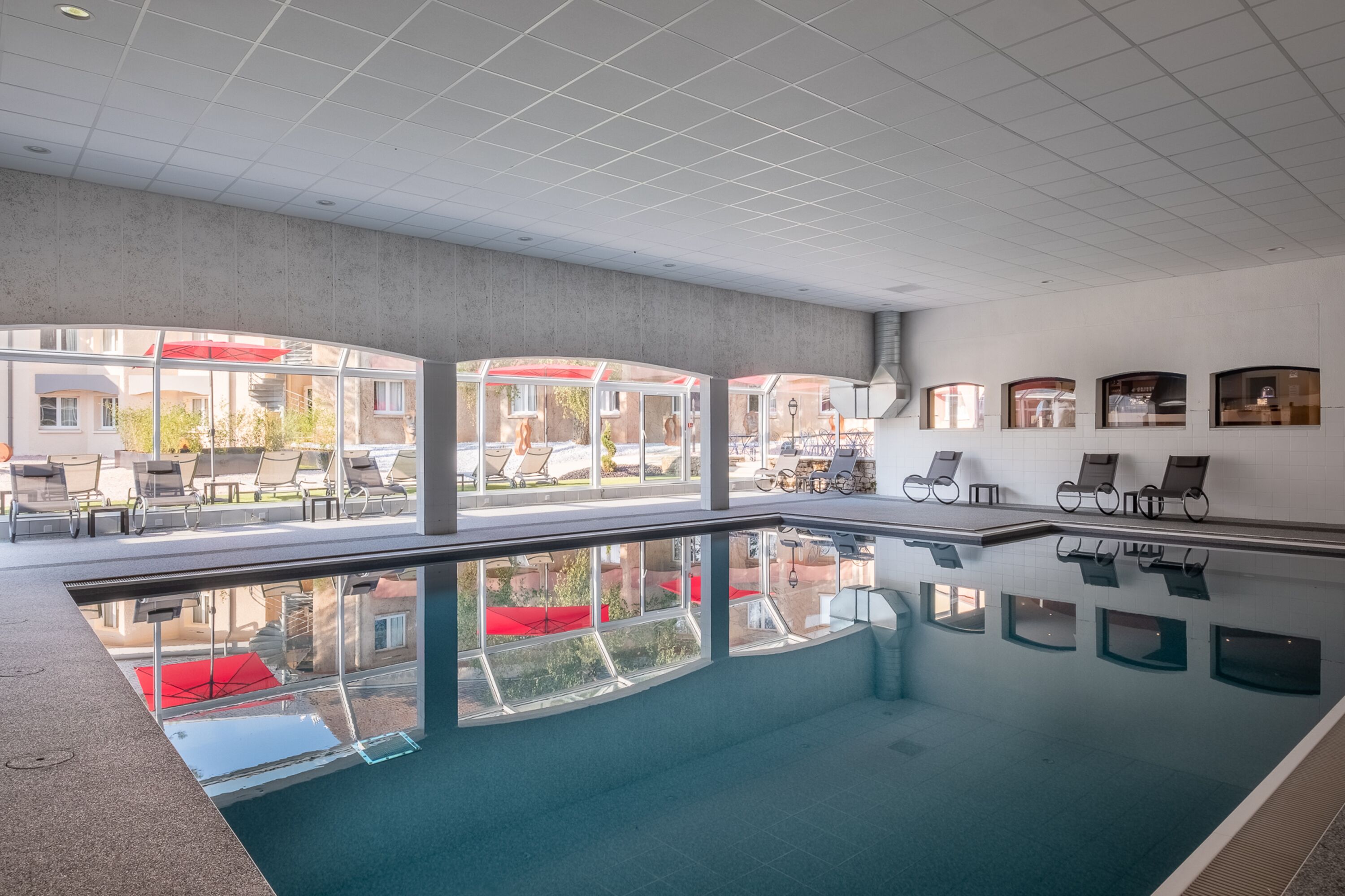 indoor pool, open 7:00 am to 11:00 pm, pool loungers