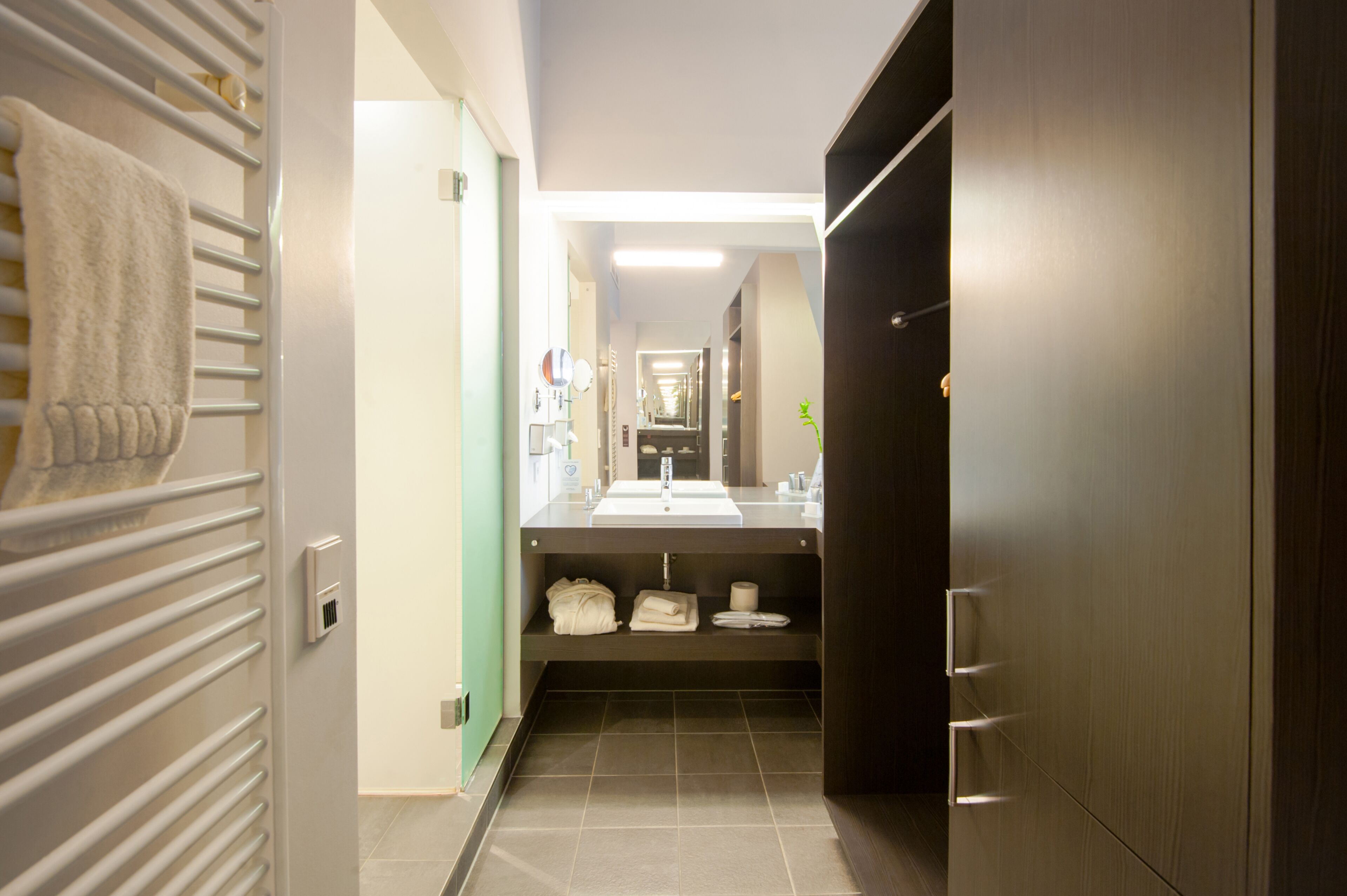deluxe double room | bathroom | separate bathtub and shower, rainfall showerhead, free toiletries
