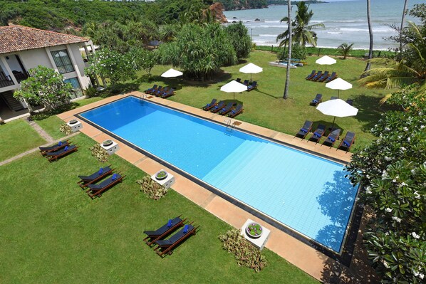 Outdoor pool, pool umbrellas, pool loungers