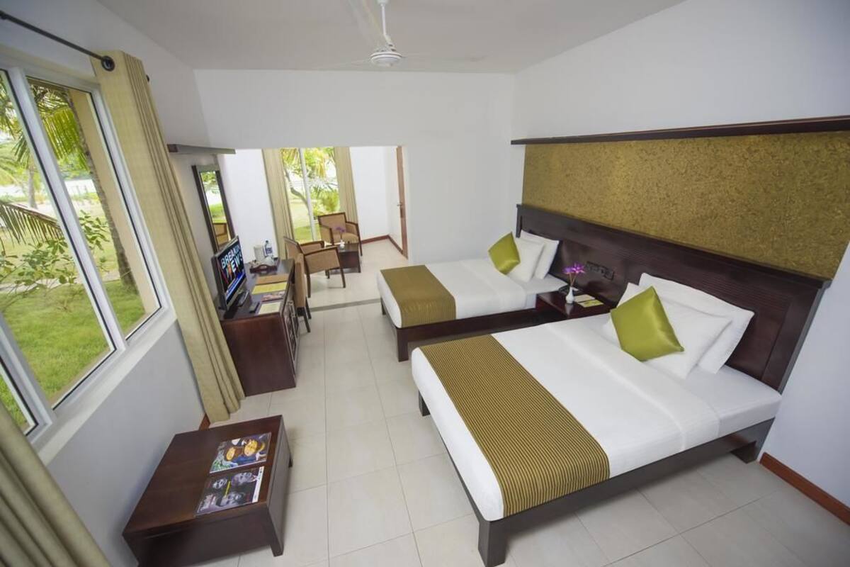 Standard Room - Lagoon View | Pillowtop beds, minibar, desk, blackout drapes