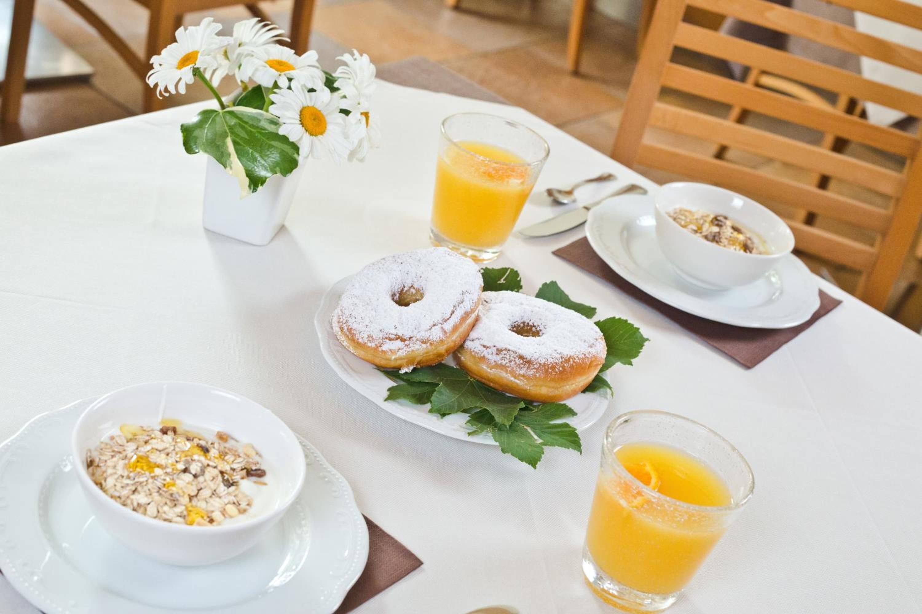 breakfast, lunch, dinner served; local cuisine, al fresco dining