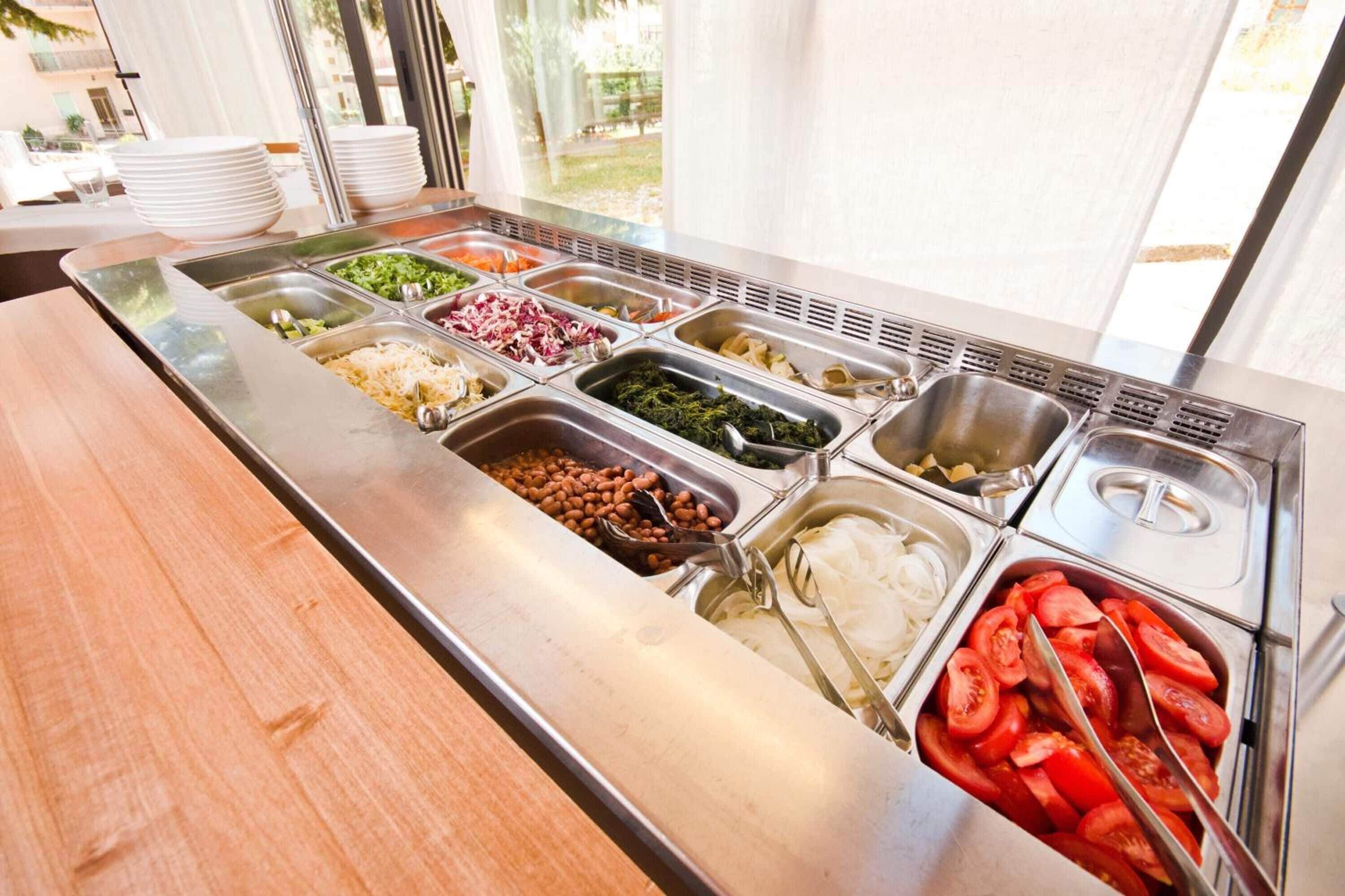 Breakfast, lunch, dinner served; local cuisine, al fresco dining 