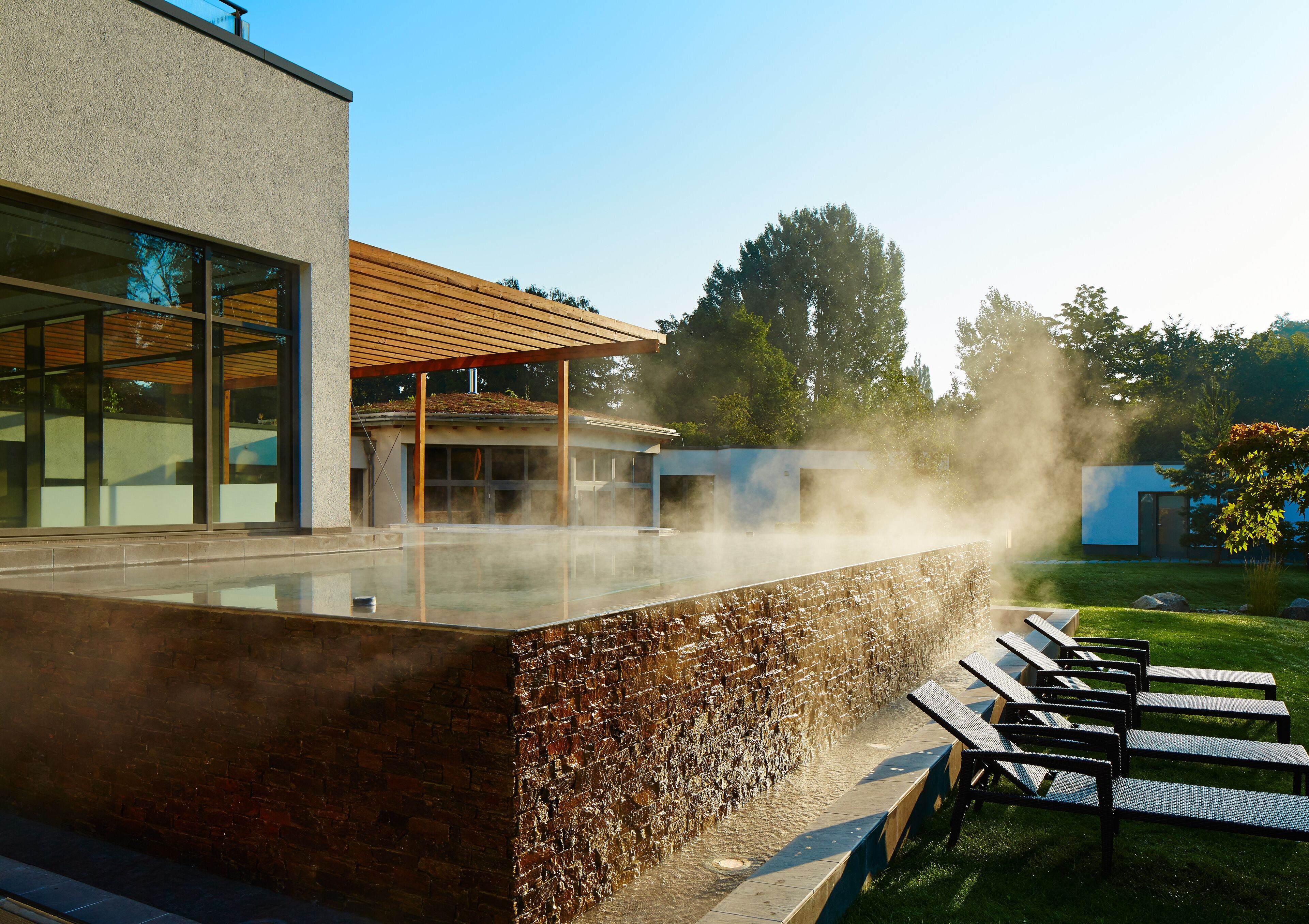 Indoor pool, outdoor pool, pool umbrellas, sun loungers