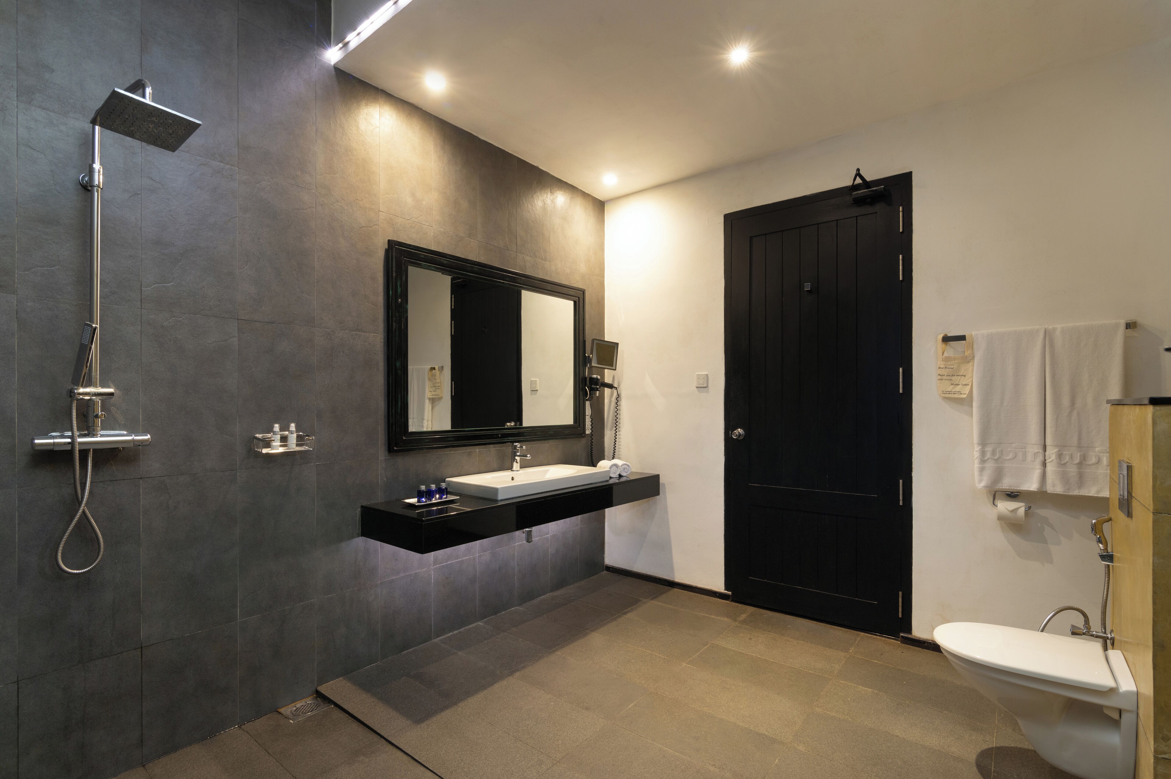 superior room | bathroom | shower, rainfall showerhead, free toiletries, hair dryer