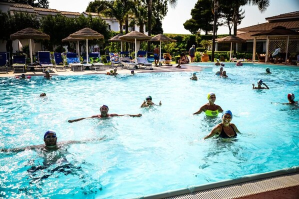 Seasonal outdoor pool, pool loungers