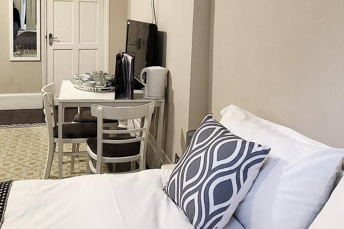 Family Room, 2 Double Beds and 1 Single Bed | Desk, blackout drapes, iron/ironing board, WiFi (free)