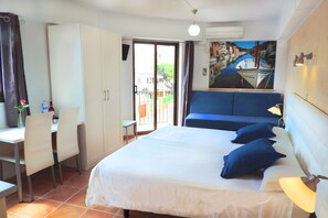 Studio, Kitchen (2 - 3 adults) | Down comforters, memory foam beds, laptop workspace, blackout drapes - Marblau Hostal (Santanyi)