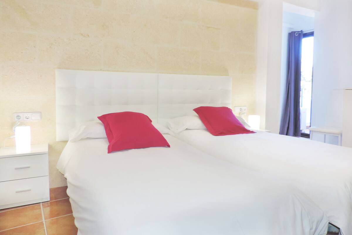 Down duvets, memory-foam beds, laptop workspace, blackout curtains