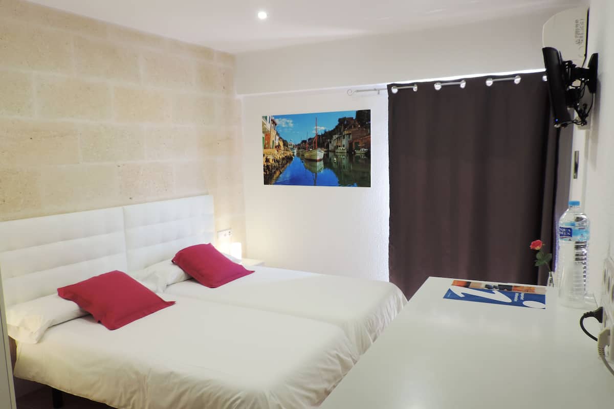 Down duvets, memory-foam beds, laptop workspace, blackout curtains