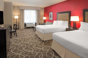 A hotel room with two beds, a desk, a chair, a TV, and a window with curtains. - Holiday Inn Express Klamath - Redwood Ntl Pk Area by IHG (Klamath)