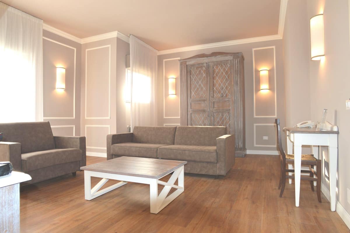 Premium Double or Twin Room | Living room | LCD TV