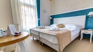 Doppel- oder Zweibettzimmer