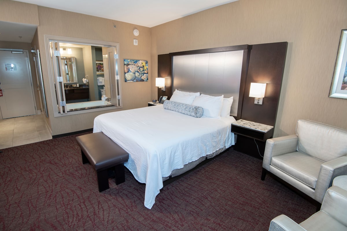 Deluxe Wide King Suite | 1 bedroom, premium bedding, in-room safe, iron/ironing board