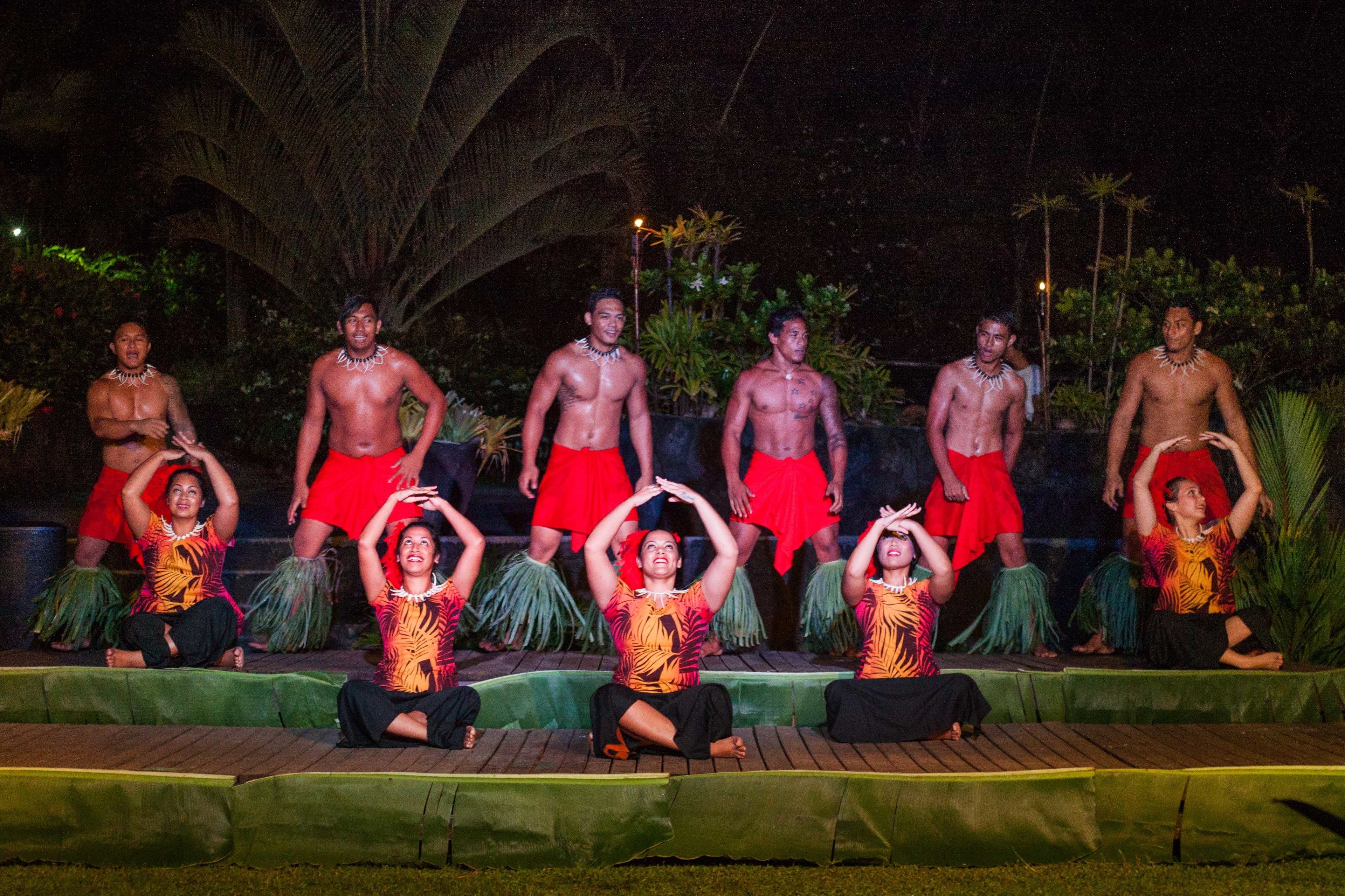 A stage with performers in traditional attire.
