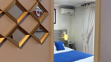 Apartment, 1 Bedroom | Down duvets, in-room safe, individually furnished, desk