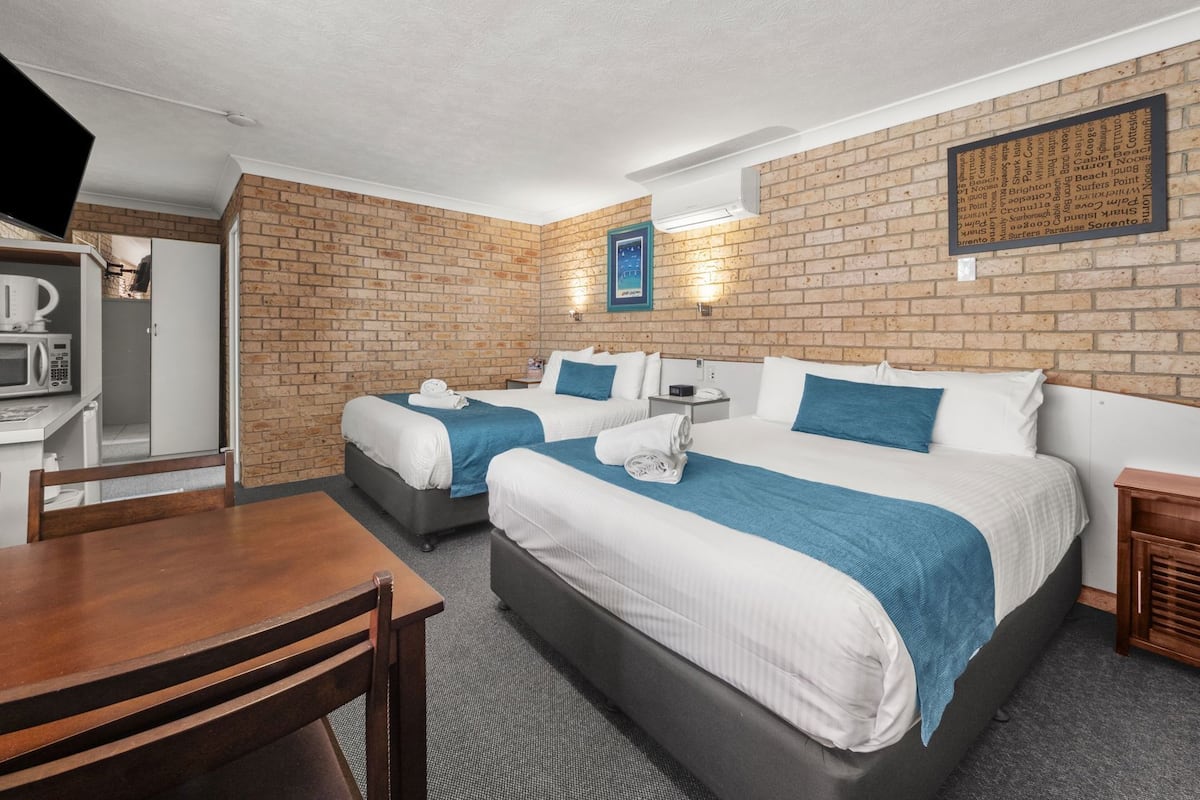 Premium bedding, pillow-top beds, minibar, in-room safe