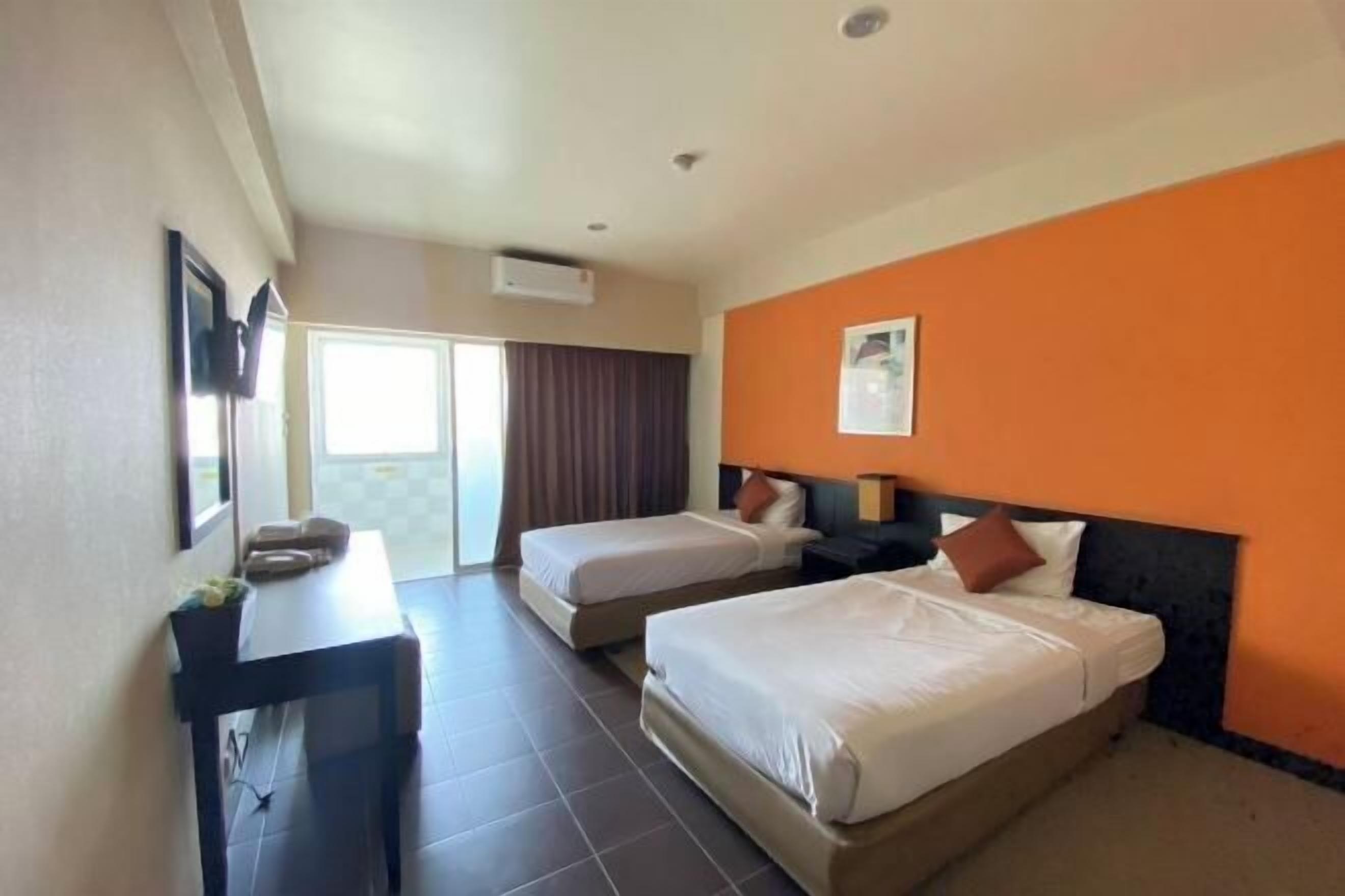 Free minibar items, in-room safe, desk, rollaway beds