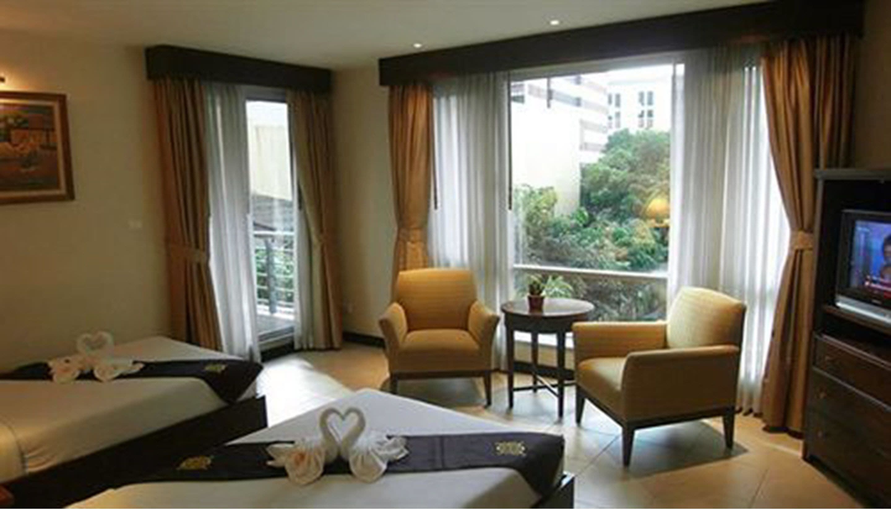 Habitación superior | Zona de estar