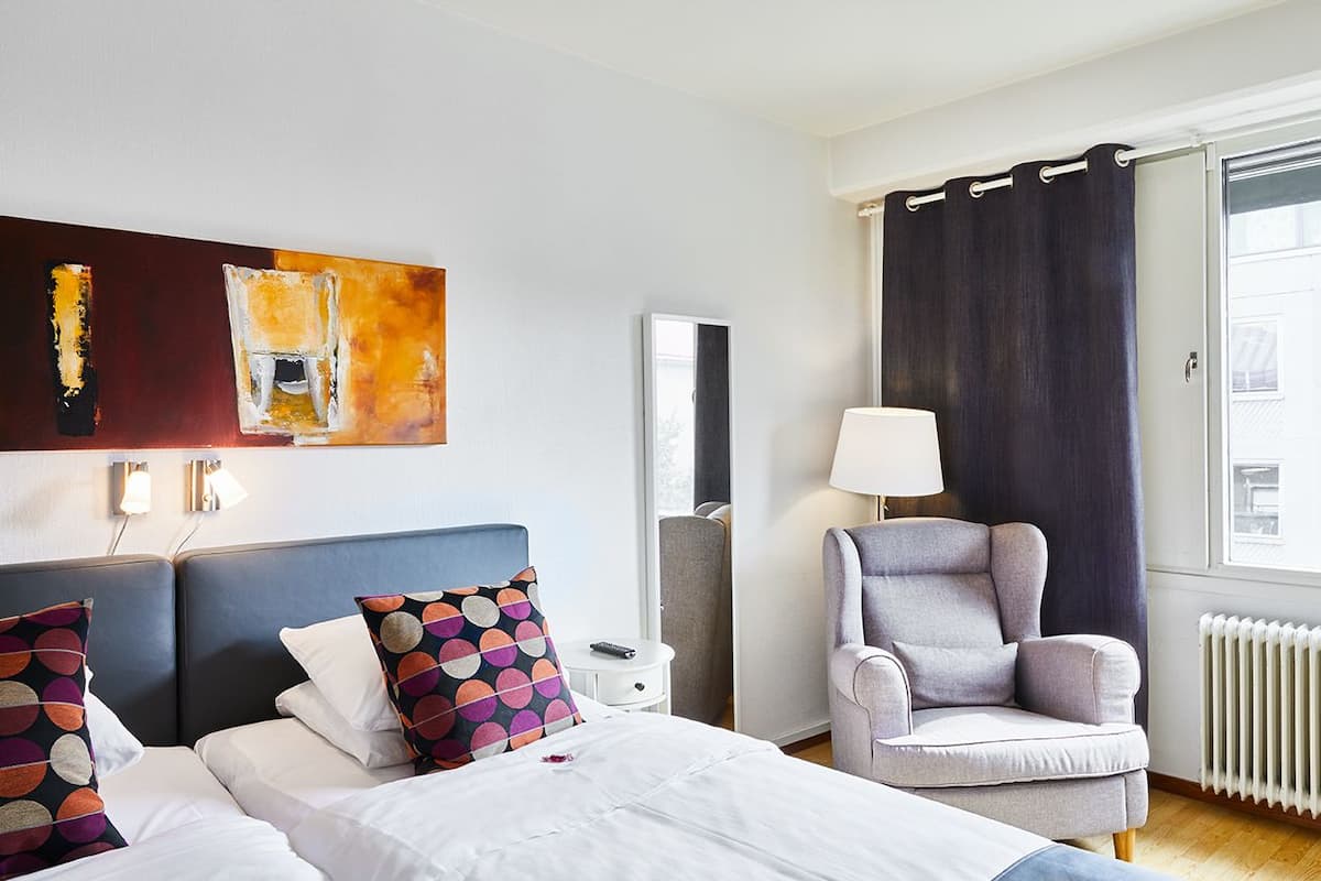 Desk, blackout drapes, iron/ironing board, free WiFi