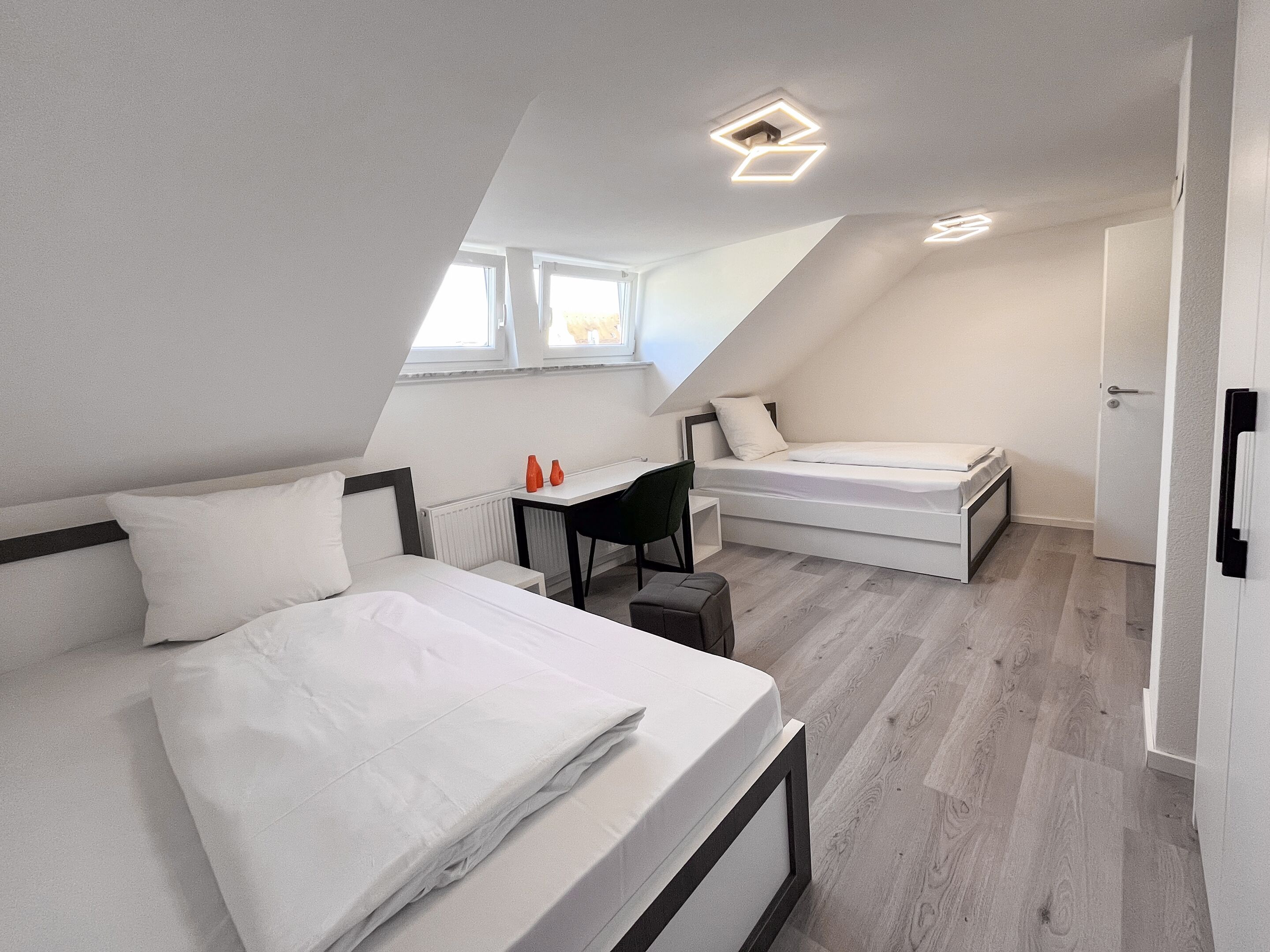 Basic Twin Room, Shared Bathroom | Minibar, desk, laptop workspace, free WiFi