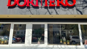 A storefront with the name 'DORMERO' in red letters. - DORMERO Hotel Reutlingen (Reutlingen)