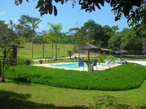 Outdoor pool, pool umbrellas, pool loungers