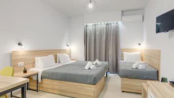 Superior kamer, 1 twee- of 2 eenpersoonsbedden | Een bureau, een strijkplank/strijkijzer, gratis babybedden, beddengoed