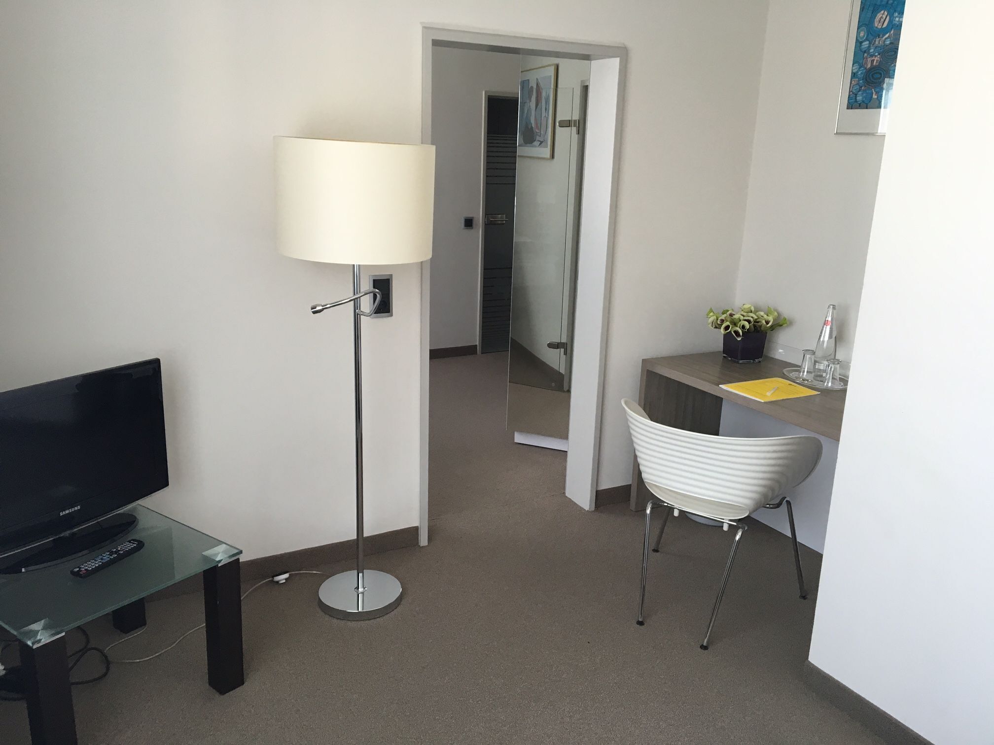 business room, courtyard area | in-room safe, desk, blackout curtains, soundproofing