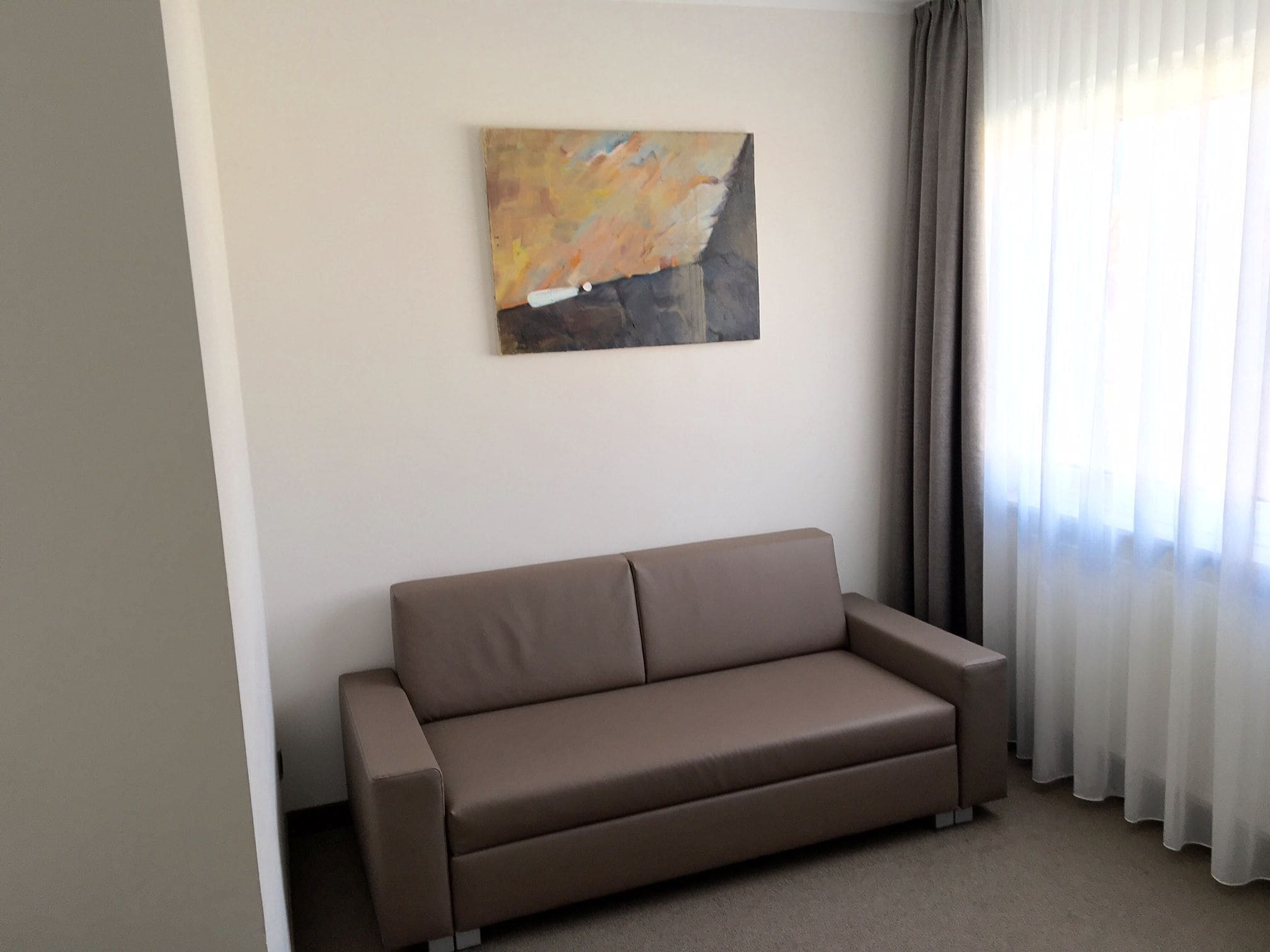 business room, courtyard area | in-room safe, desk, blackout curtains, soundproofing