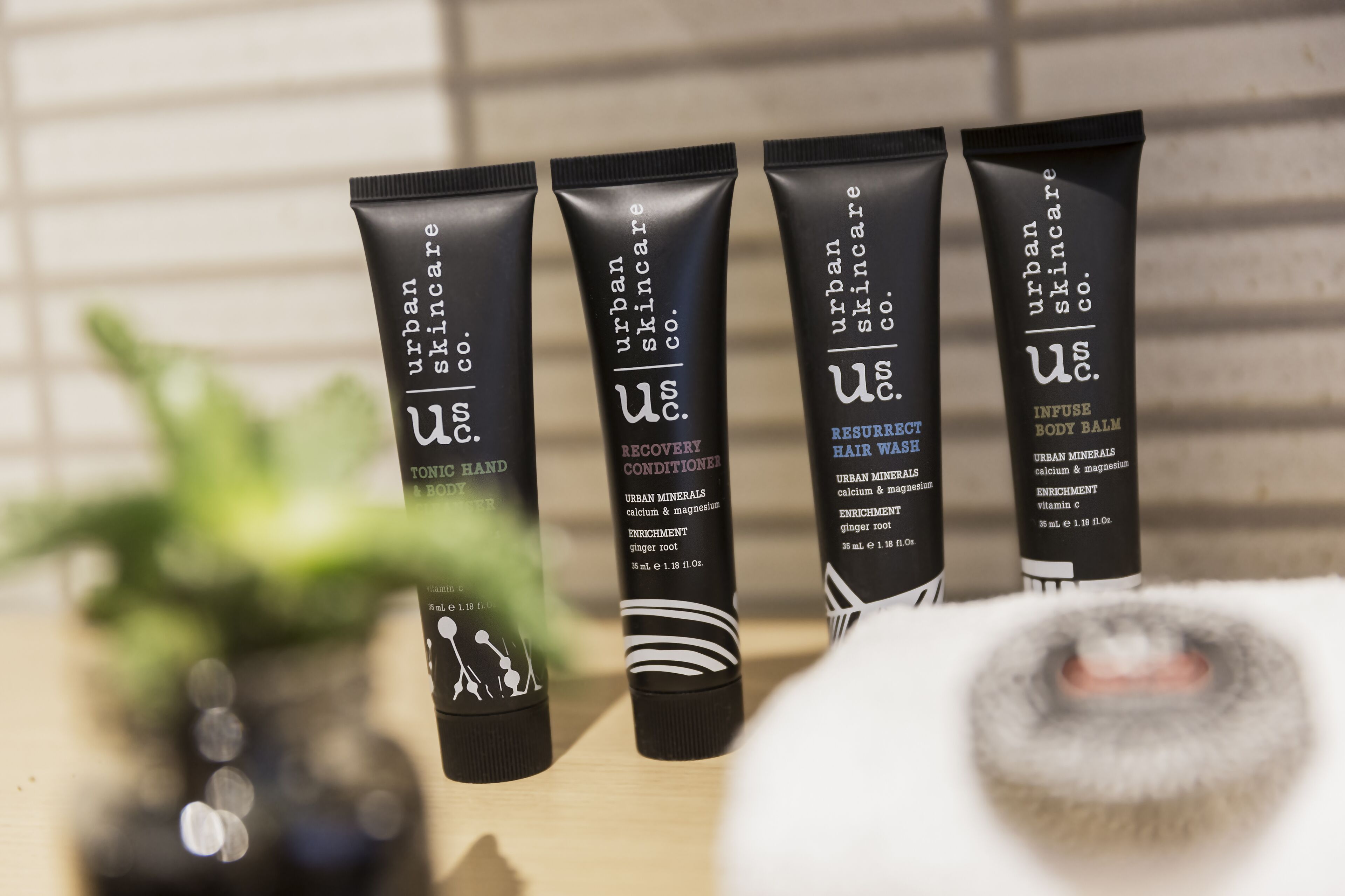 shower, designer toiletries, hair dryer, towels