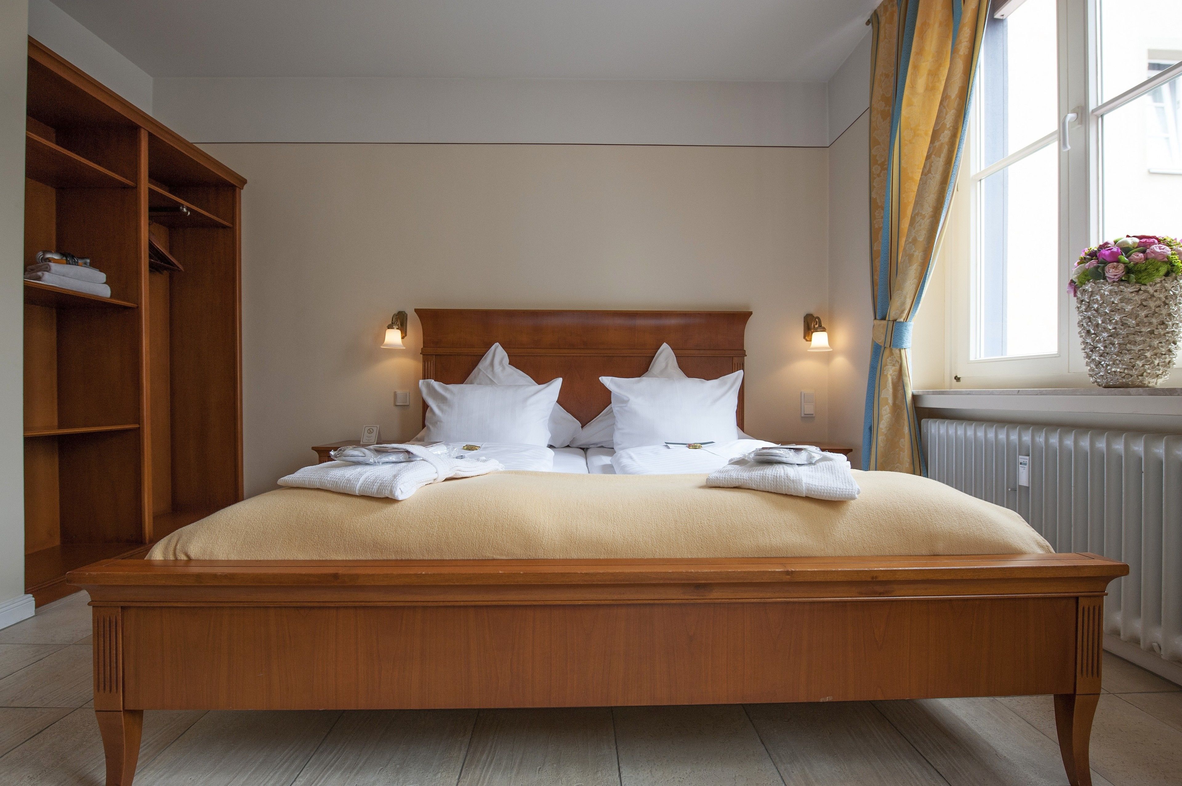 desk, blackout curtains, iron/ironing board, rollaway beds