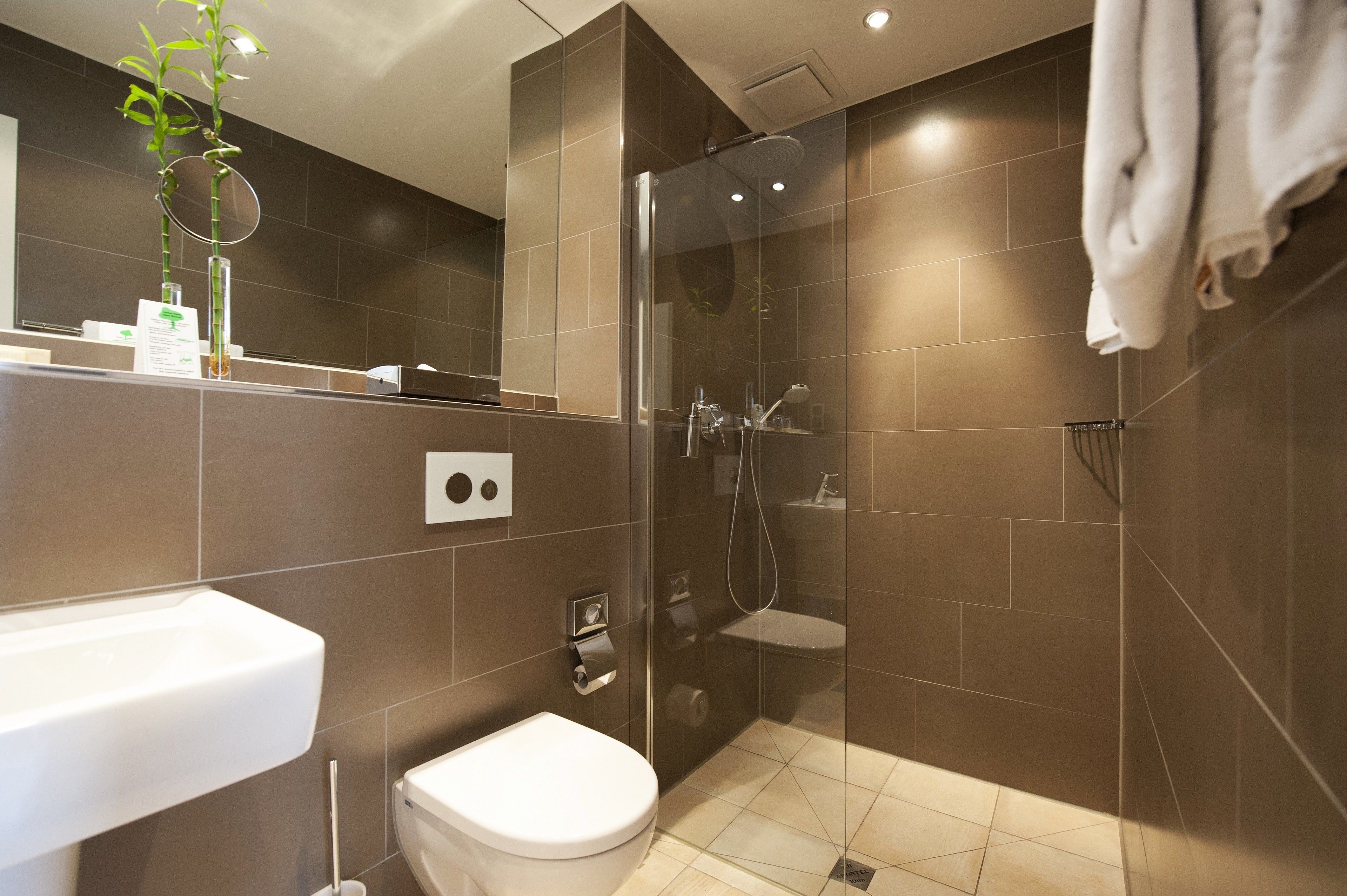 shower, rainfall showerhead, hair dryer, slippers