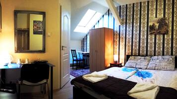 Standard Double Room, Private Bathroom | Individually decorated, individually furnished, desk, iron/ironing board