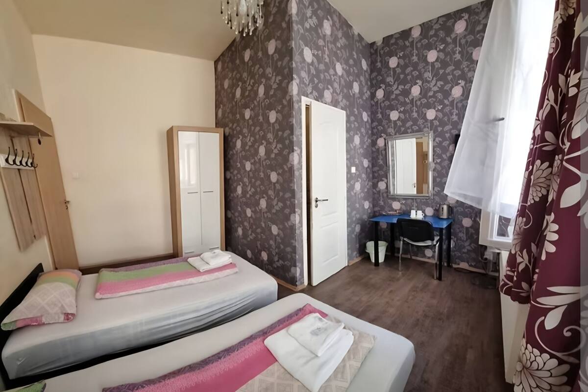 Standard Twin Room, Private Bathroom | Individually decorated, individually furnished, desk, iron/ironing board